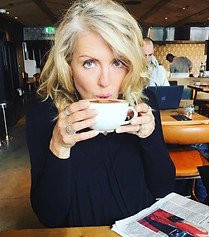 Ella lucas averett, womens coach and podcast host, drinking coffee in cafe